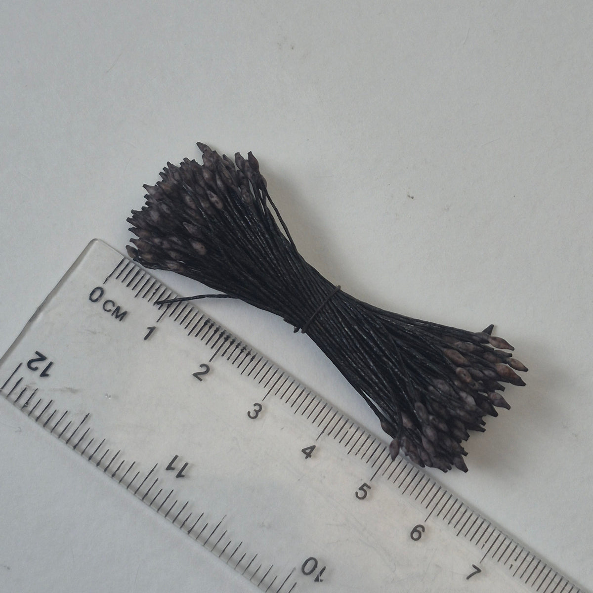 Miniature brown elongated flower stamens size S on matching brown cotton threads, premium Japanese floral supplies