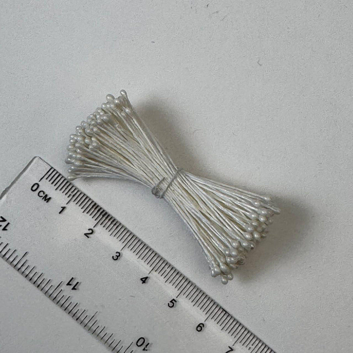 Cream pearl flower stamens size L with glossy finish on cream cotton threads, premium Japanese craft supplies