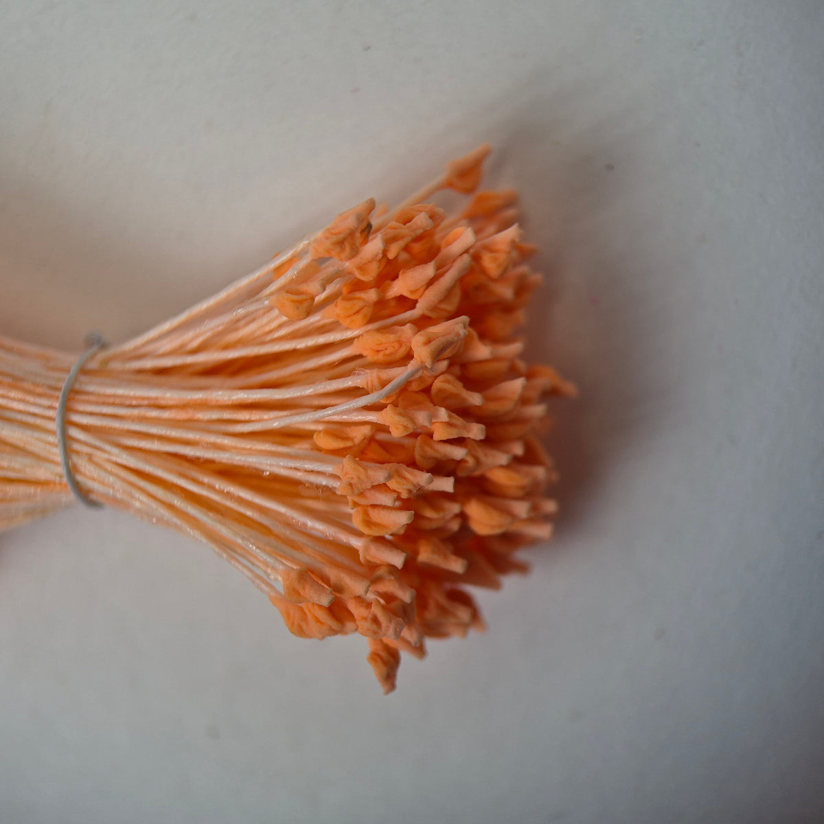 Orange naturalistic flower stamens size L with botanical shapes on orange cotton threads, premium Japanese craft supplies