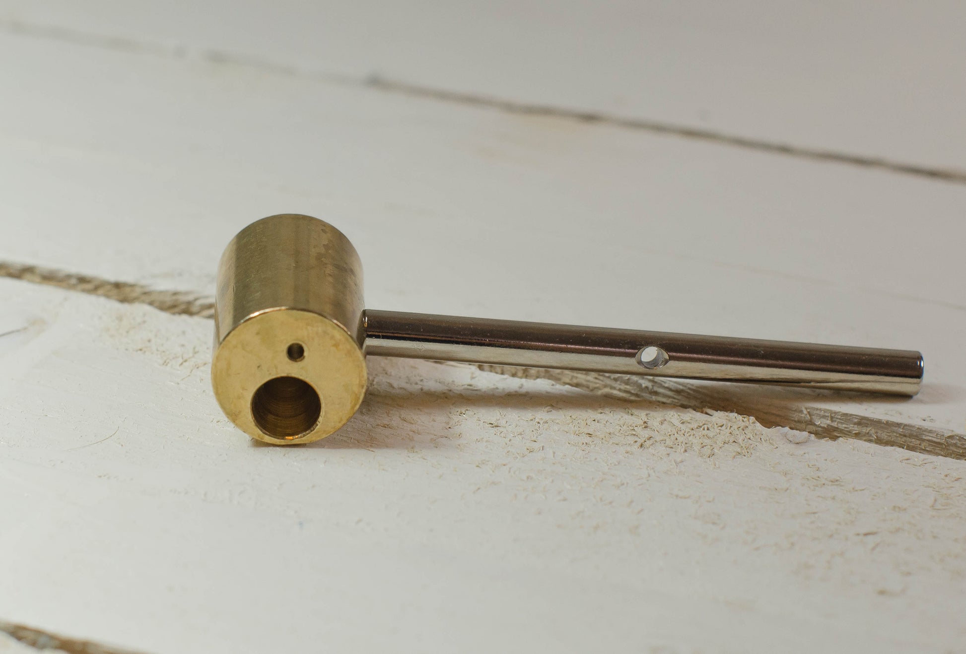Conical Hole Stem Iron Tip on a wooden surface
