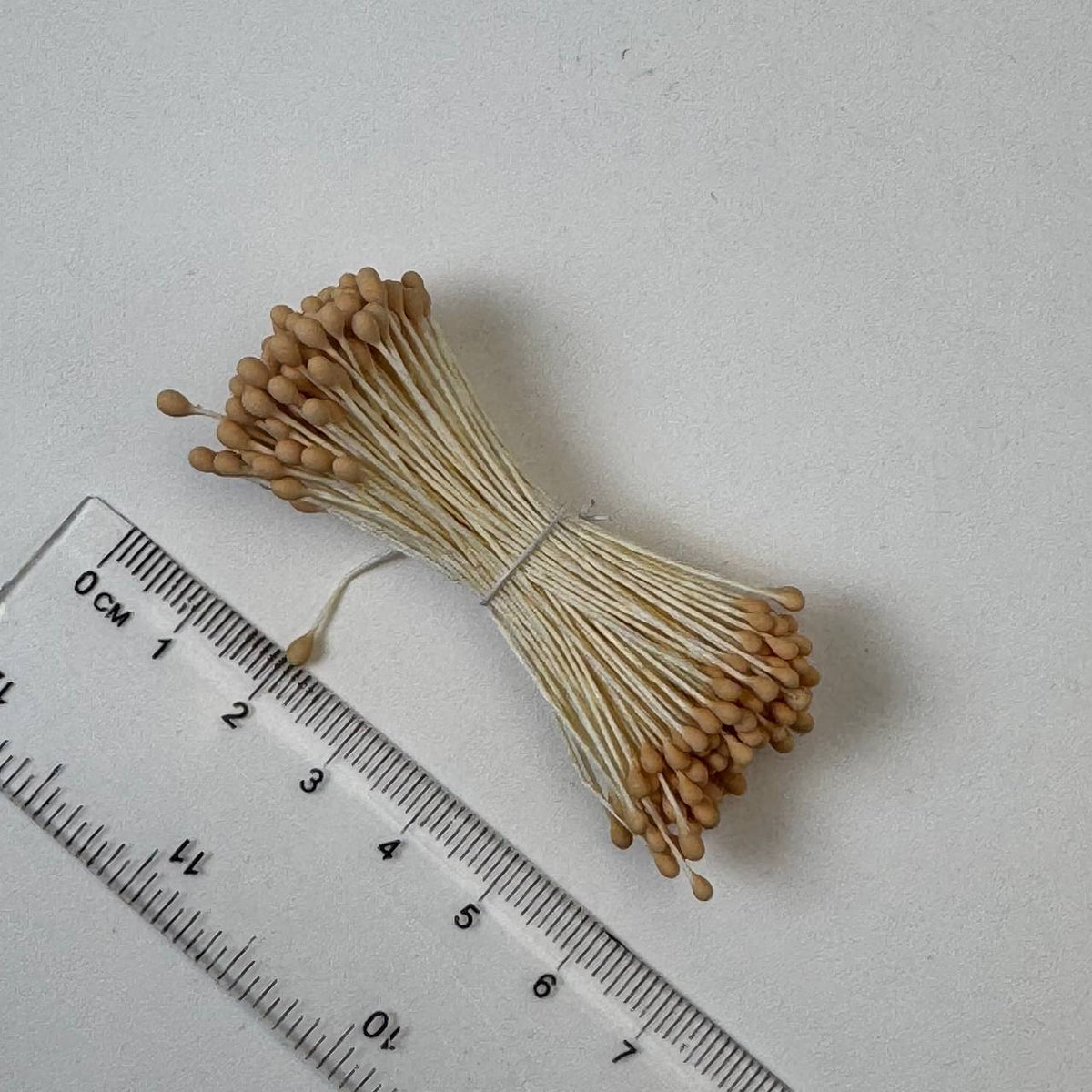 Peach naturalistic flower stamens size L with botanical shapes on cream cotton threads, bundle of 144 pieces, premium Japanese craft supplie