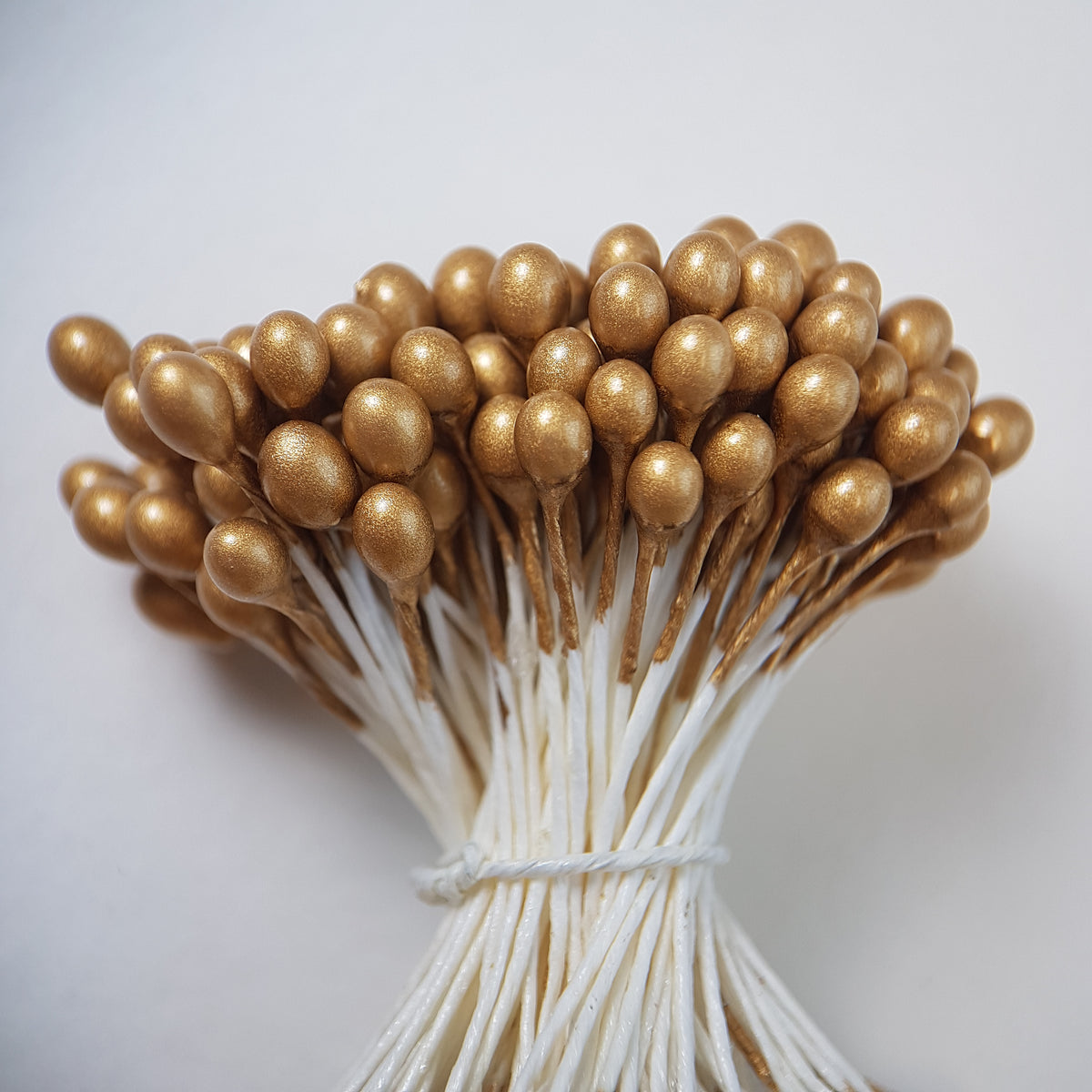 A bundle of extra-large size XL Japanese flower stamens made of rice flour and white rayon threads, featuring elegant gold round heads