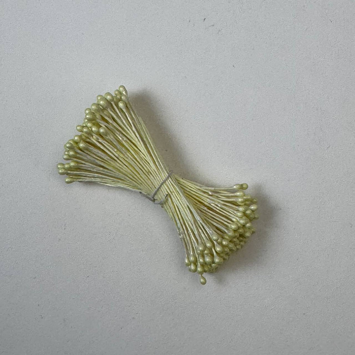 Yellow pearly round ball flower stamens size M with glossy luster on matching yellow cotton threads, premium Japanese craft supplies