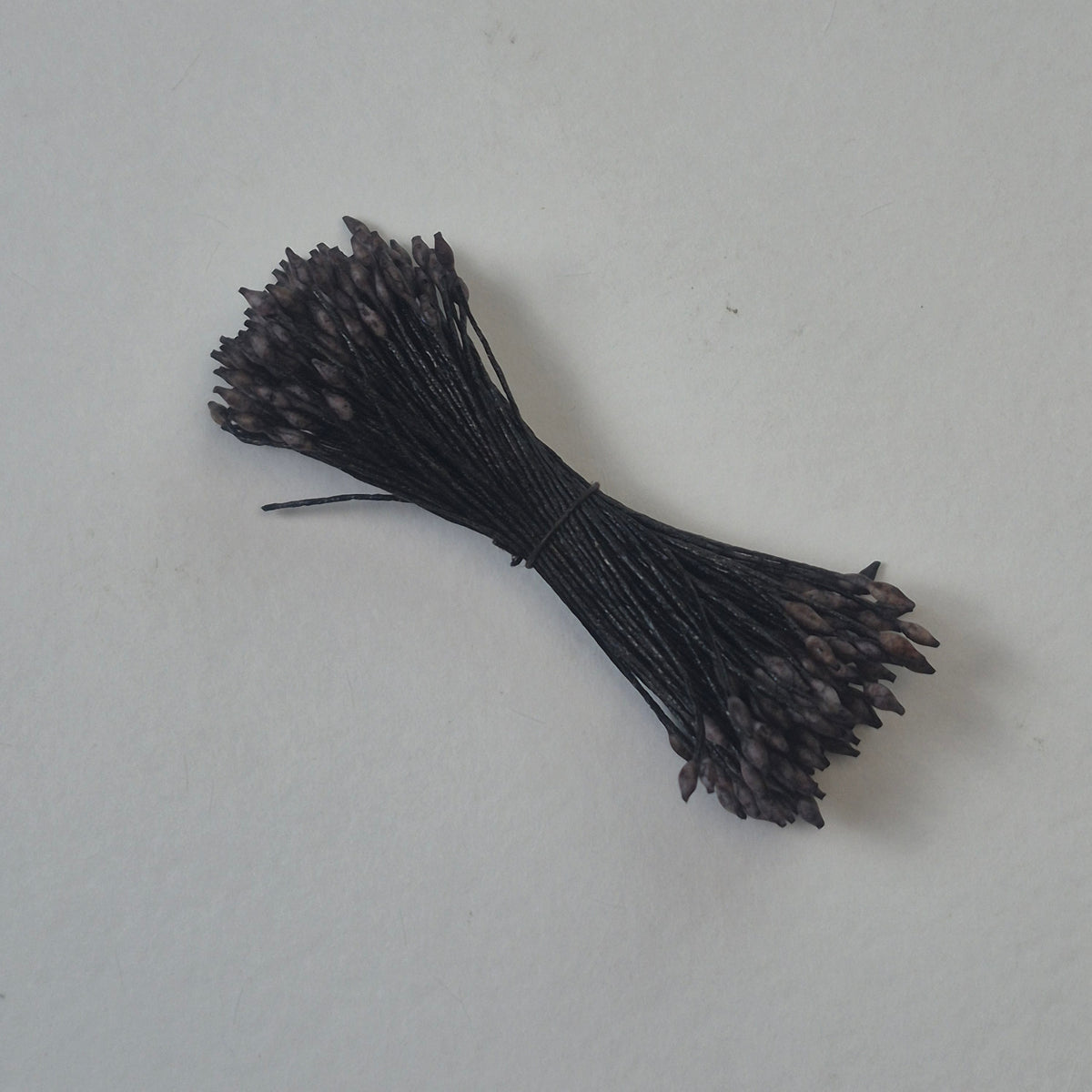 Miniature brown elongated flower stamens size S on matching brown cotton threads, premium Japanese floral supplies
