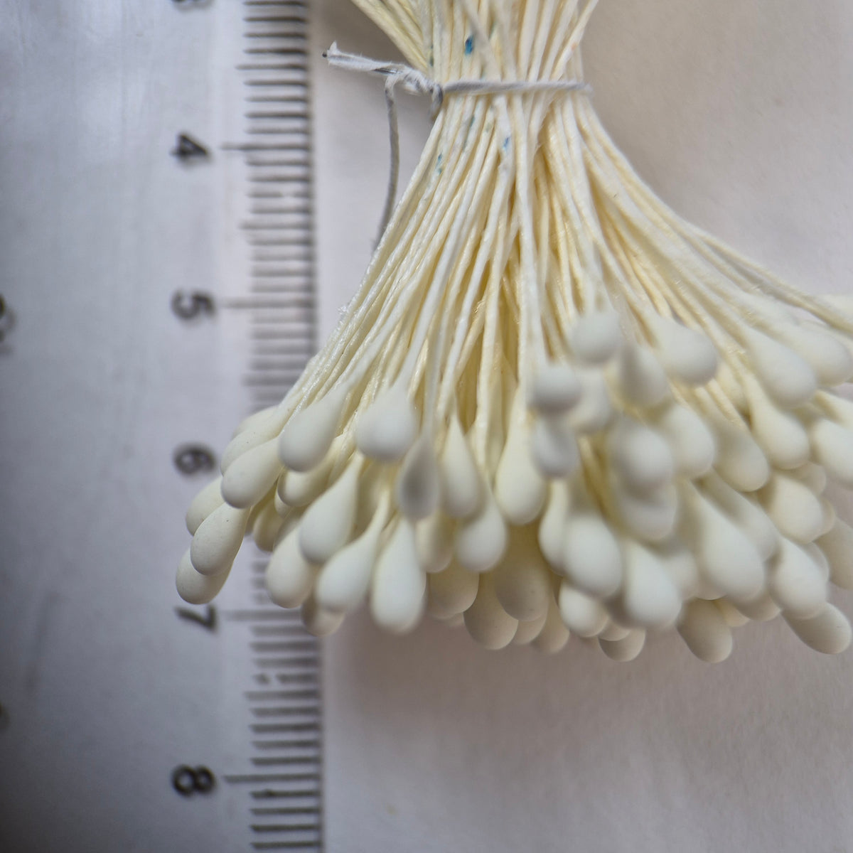 Cream pearl flower stamens size L with glossy finish on cream cotton threads, premium Japanese craft supplies