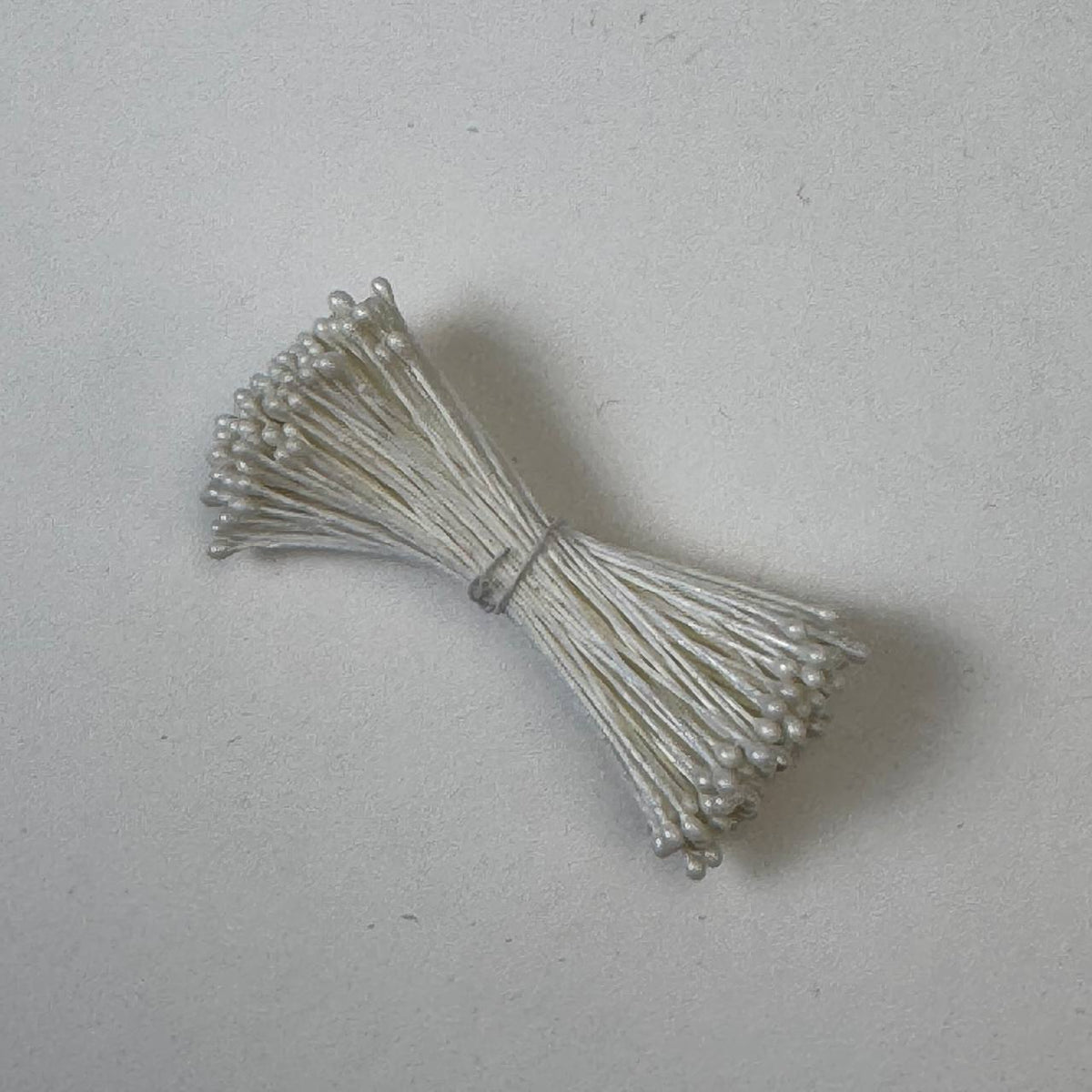 Cream pearl flower stamens size L with glossy finish on cream cotton threads, premium Japanese craft supplies