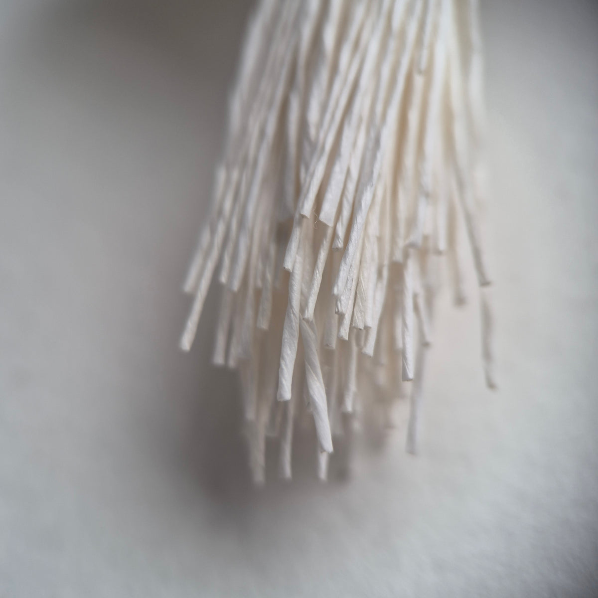 A bundle of 144 single-sided white decorative Japanese flower stamens/buds on high-quality white threads, featuring smooth droplet-shaped heads