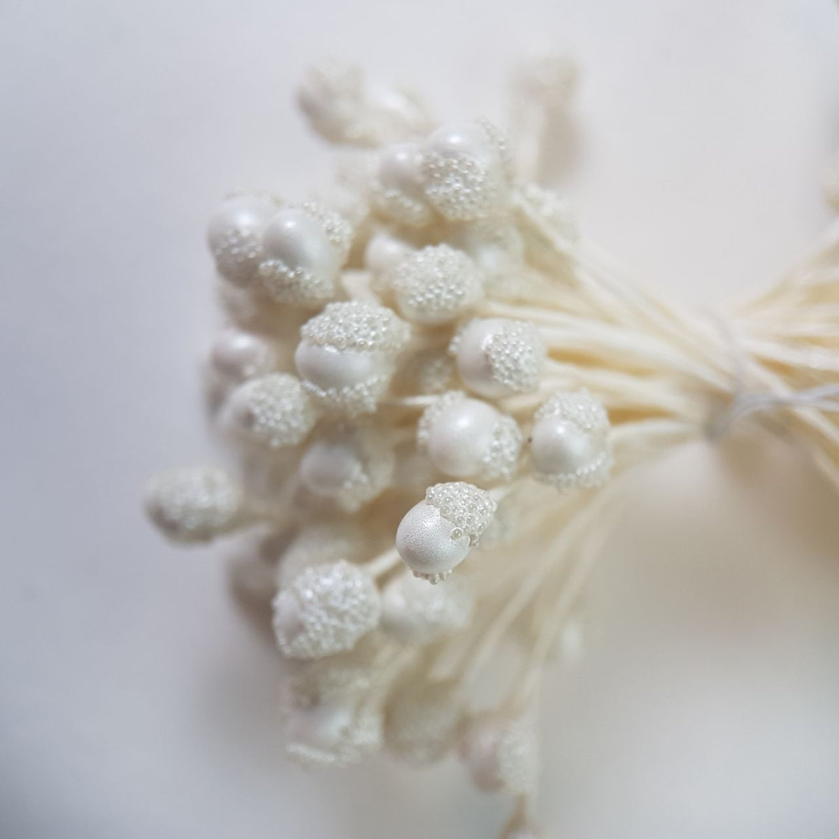 A bundle of extra-large size XL textured Japanese flower stamens, featuring elegant pearl droplet-shaped heads decorated with shimmering white microbeads