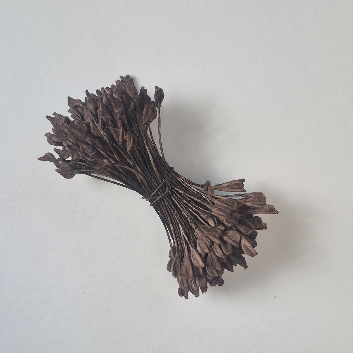 A bundle of extra-large size XL naturalistic Japanese flower stamens, featuring deep brown droplet-shaped heads on matching brown rayon threads
