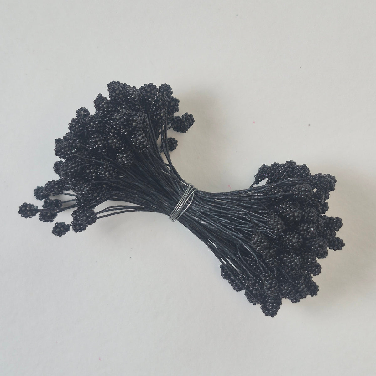 A bundle of extra-large size XL Japanese flower stamens made of rice flour and black rayon threads, featuring deep black textured gypsophila-shaped cluster heads