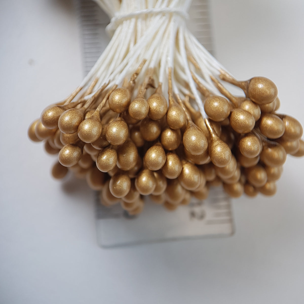 A bundle of extra-large size XL Japanese flower stamens made of rice flour and white rayon threads, featuring elegant gold round heads