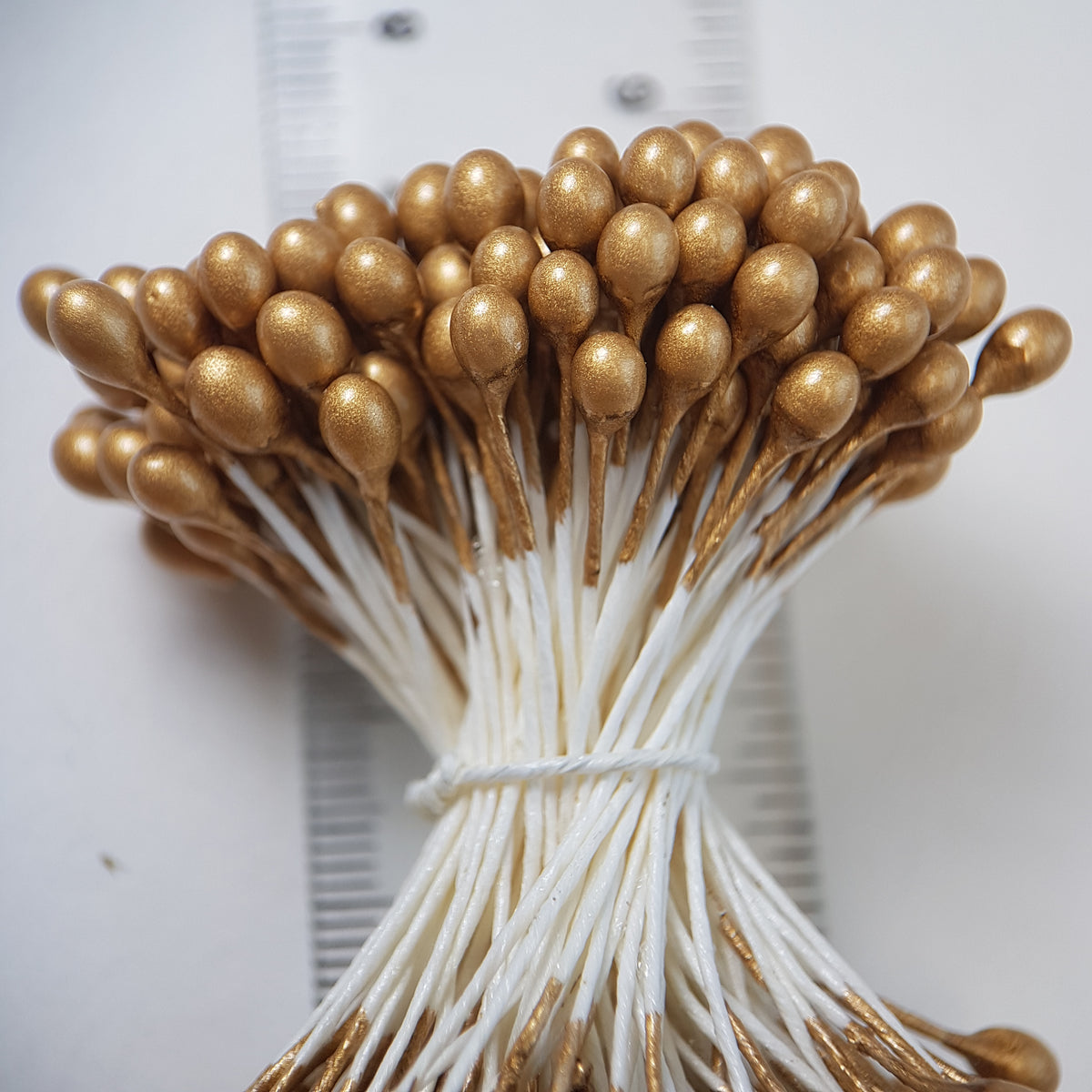 A bundle of extra-large size XL Japanese flower stamens made of rice flour and white rayon threads, featuring elegant gold round heads