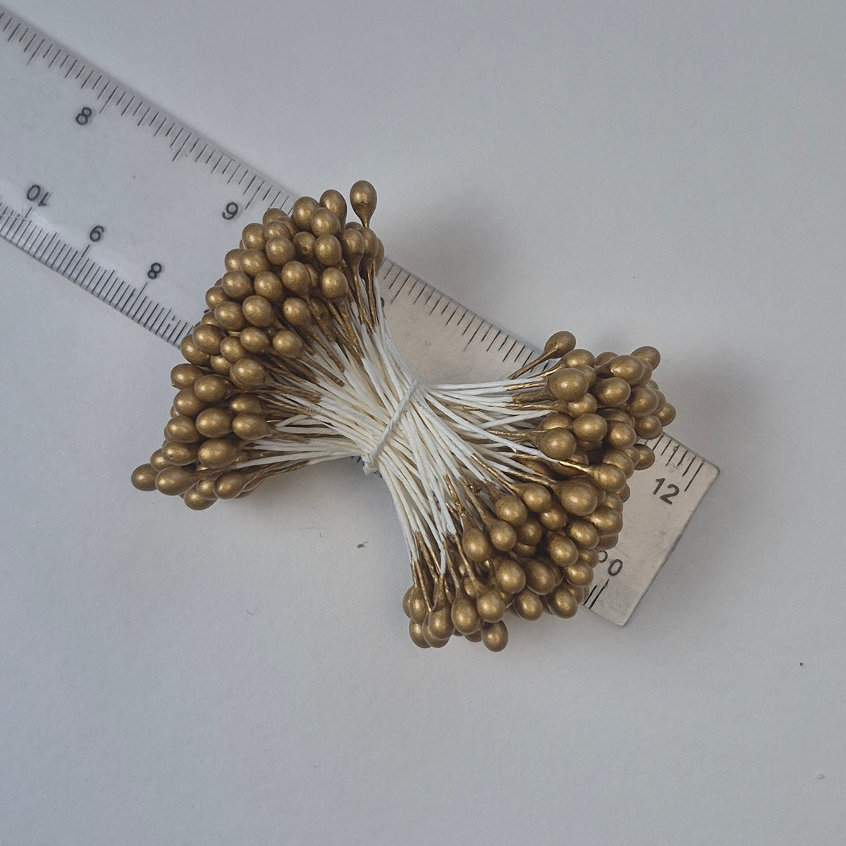 A bundle of extra-large size XL Japanese flower stamens made of rice flour and white rayon threads, featuring elegant gold round heads