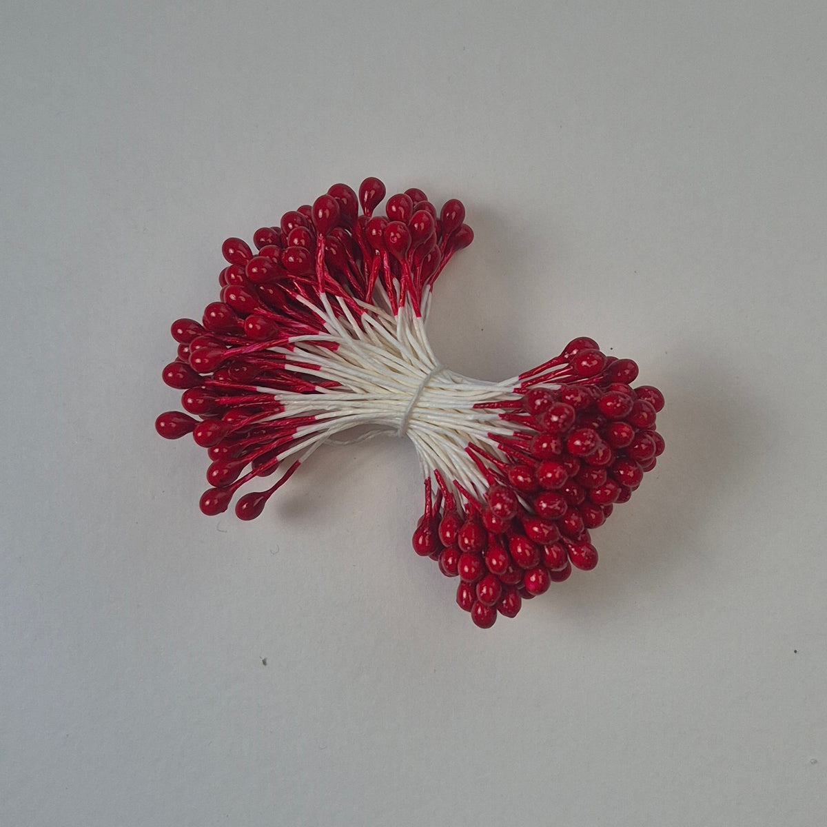 A bundle of extra-large size XL Japanese flower stamens made of rice flour and white rayon threads, featuring vibrant red round heads