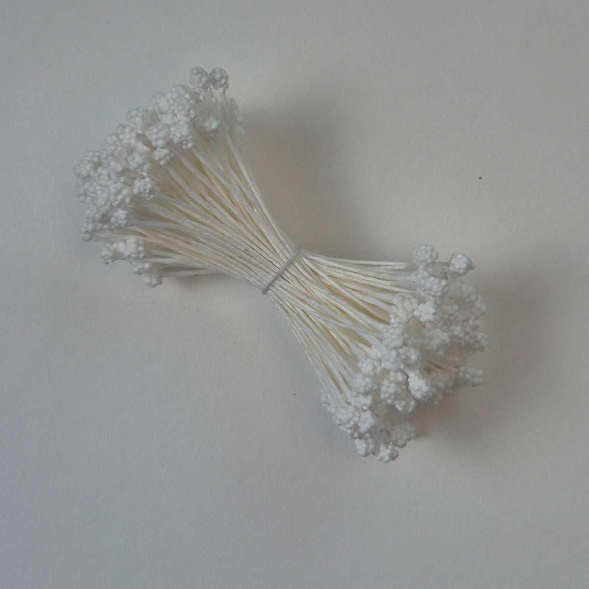 A bundle of extra-large size XL Japanese flower stamens made of rice flour and white rayon threads, featuring pure white textured gypsophila-shaped cluster heads next to a ruler