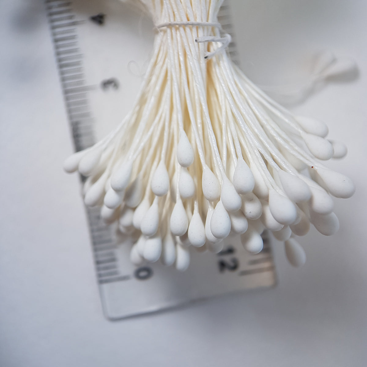 A bundle of extra-large size XL Japanese flower stamens made of rice flour and white rayon threads, featuring pure white round heads