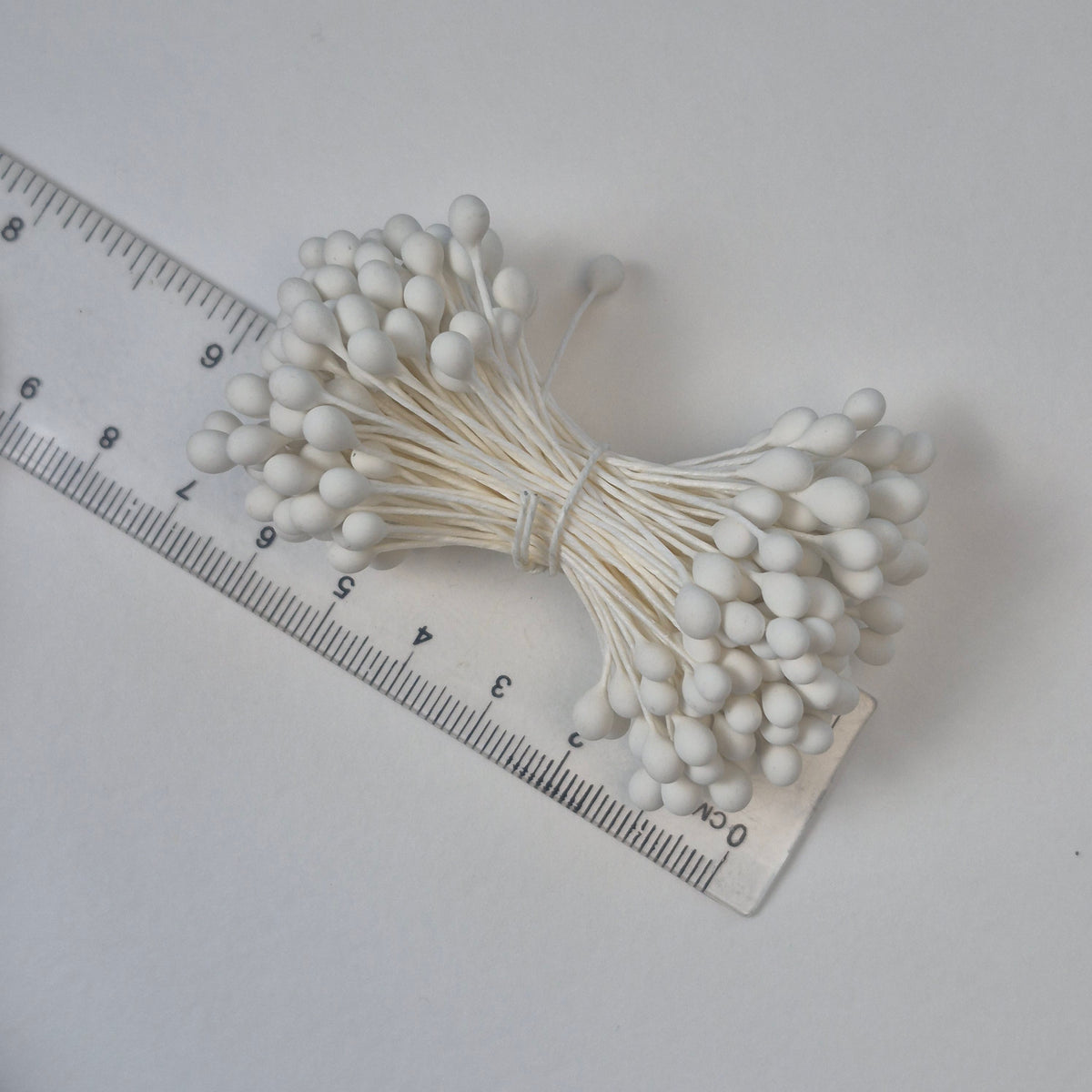A bundle of extra-large size XL Japanese flower stamens made of rice flour and white rayon threads, featuring pure white round heads
