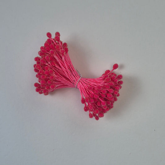 A bundle of size XL Japanese bright pink sugar ball flower stamens made of rice flour and matching pink rayon threads, featuring 5mm frosted textured round heads next to a ruler