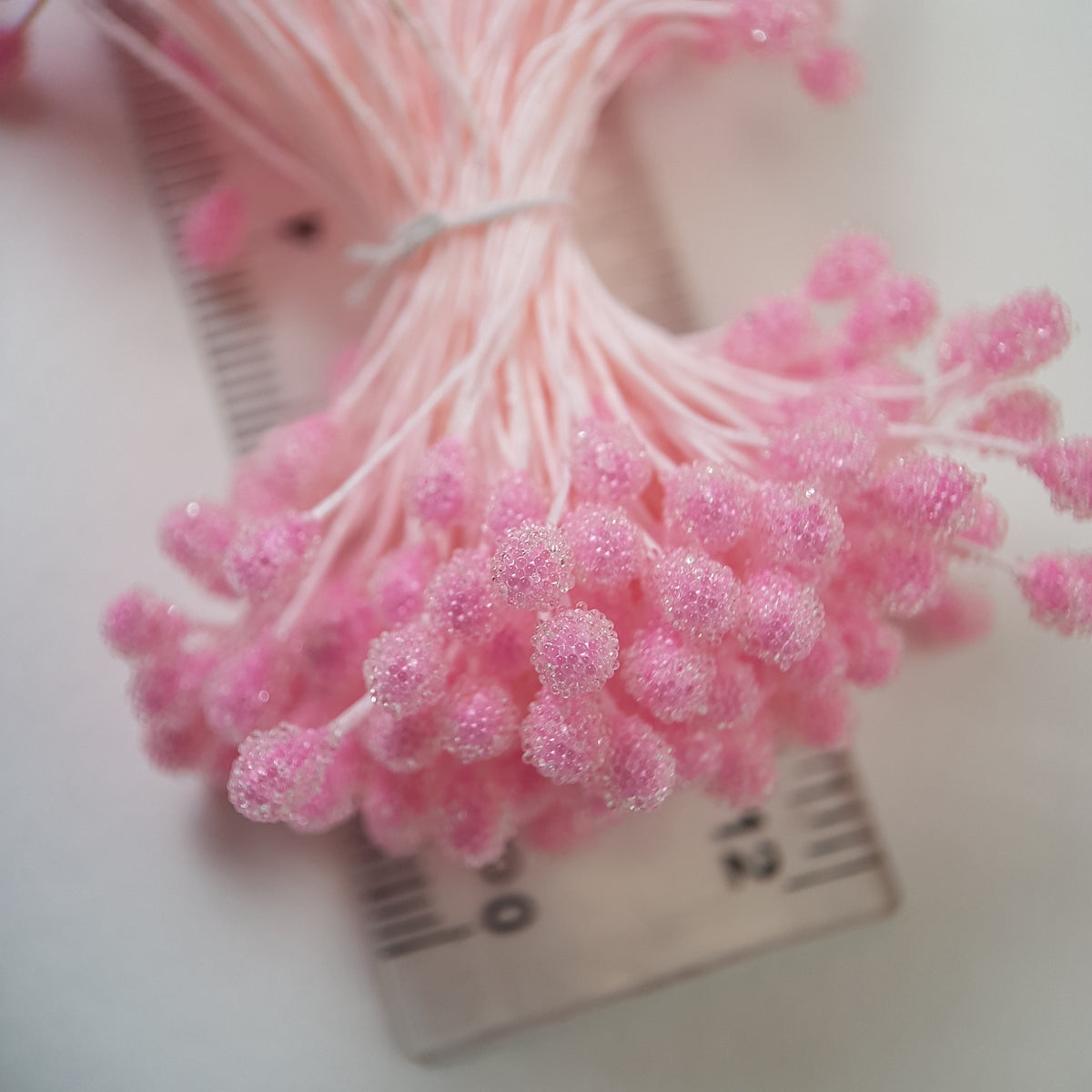 A bundle of size XL Japanese pink sugar ball flower stamens made of rice flour and cream rayon threads, featuring 5mm frosted round heads