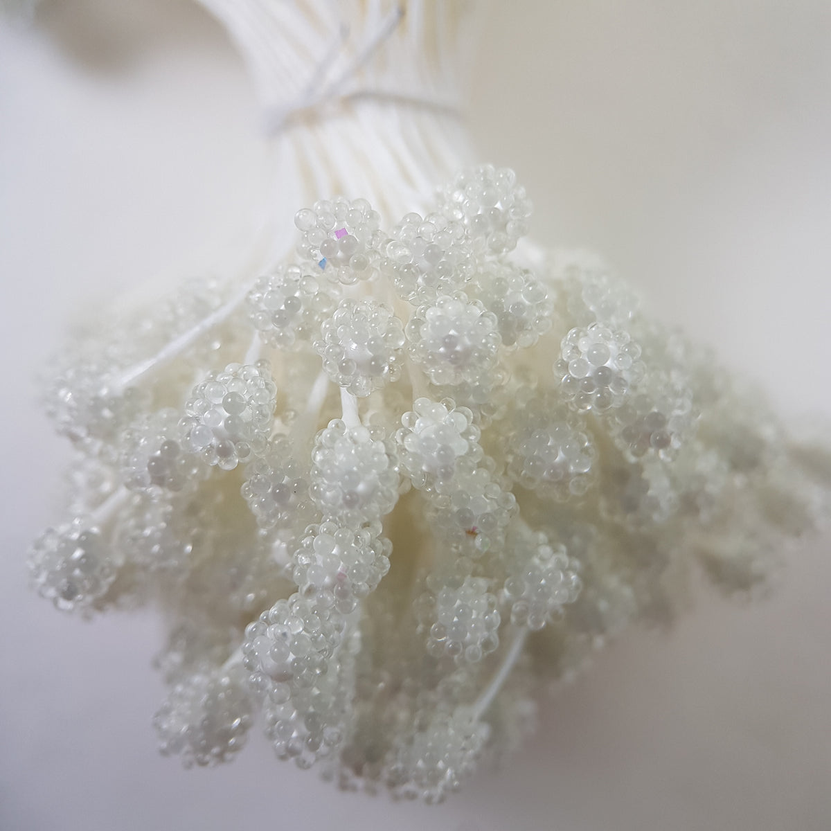 A bundle of size XL Japanese white sugar ball flower stamens made of rice flour and white rayon threads, featuring 5mm frosted round heads