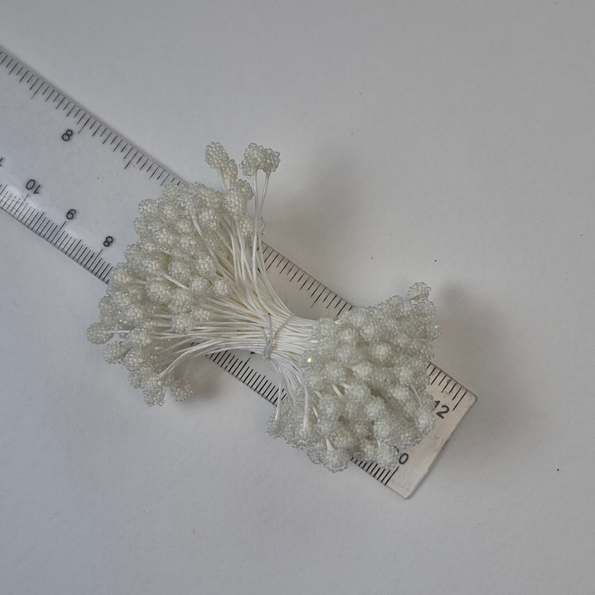 A bundle of size XL Japanese white sugar ball flower stamens made of rice flour and white rayon threads, featuring 5mm frosted round heads
