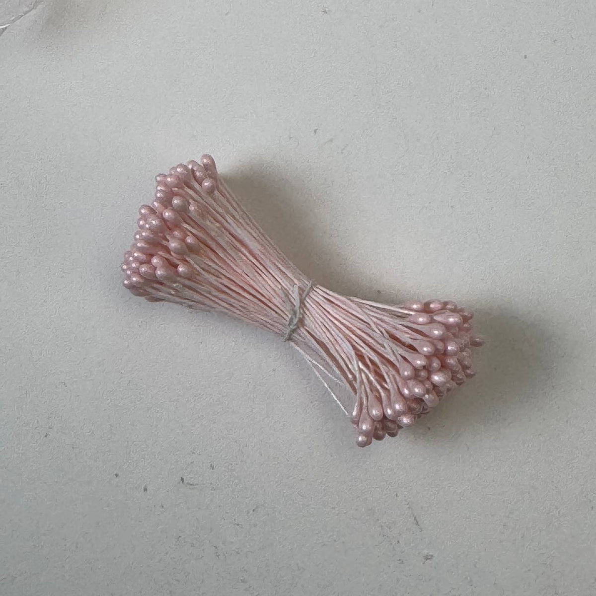 Pink naturalistic flower stamens size L with botanical shapes on white cotton threads, premium Japanese craft supplies