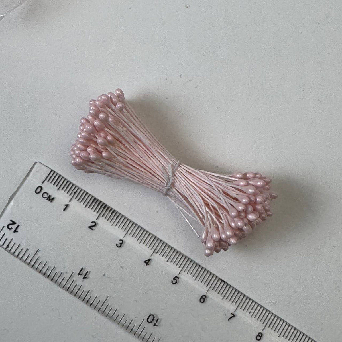 Pink naturalistic flower stamens size L with botanical shapes on white cotton threads, premium Japanese craft supplies