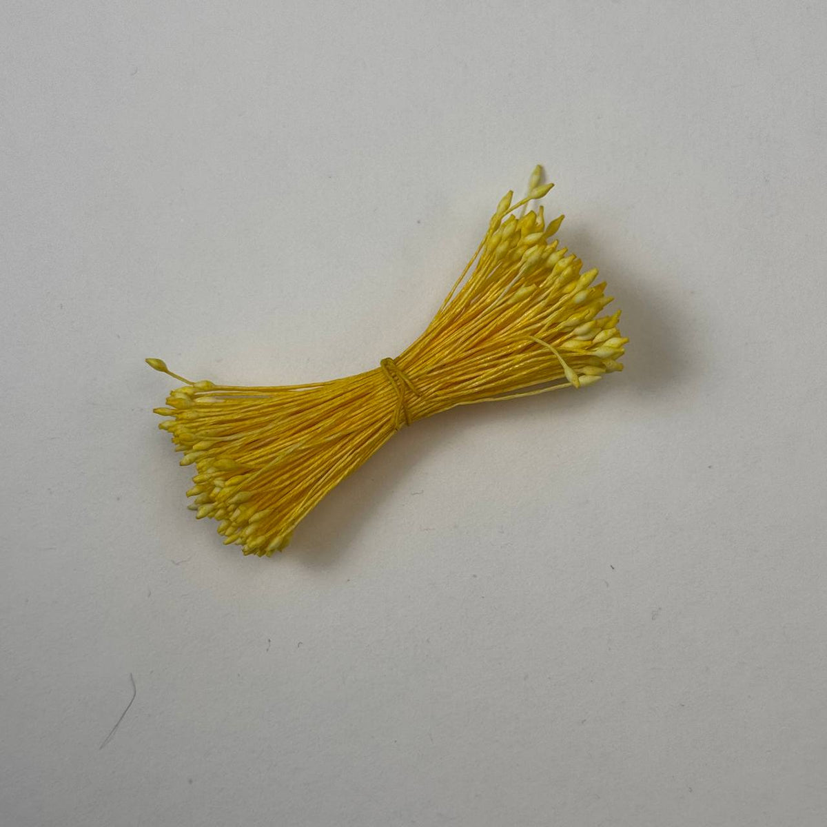 Miniature yellow elongated flower stamens size S on matching yellow cotton threads, premium Japanese floral supplies